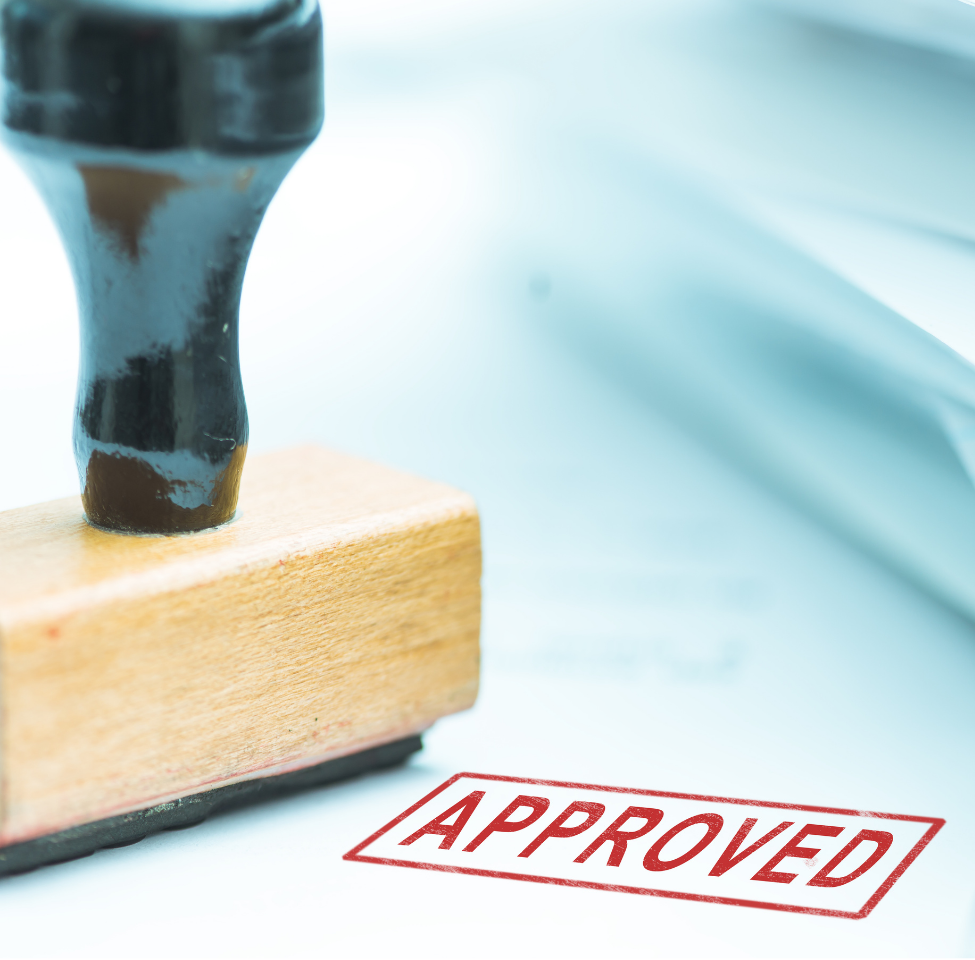 Life insurance policy approved. Picture of rubber stamp approval.