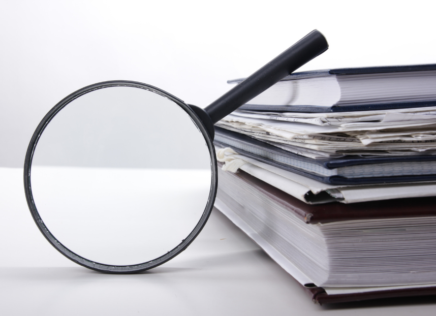 A Sample Case - picture of a magnifying glass and a stack of papers