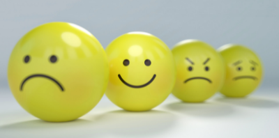 Characteristics of Depression - picture of smiley and frowny faces