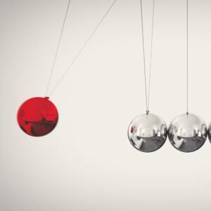 a red pendulum swinging away from stationary silver pendulums representing that the pendulum has swung to a  more aggressive underwriting position